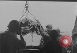 Image of Wounded evacuated from damaged ship Normandy France, 1944, second 12 stock footage video 65675080938