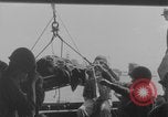Image of Wounded evacuated from damaged ship Normandy France, 1944, second 14 stock footage video 65675080938