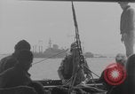 Image of Wounded evacuated from damaged ship Normandy France, 1944, second 18 stock footage video 65675080938