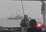 Image of Wounded evacuated from damaged ship Normandy France, 1944, second 21 stock footage video 65675080938