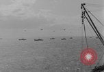Image of casualties evacuated from landing craft Normandy France, 1944, second 22 stock footage video 65675080939