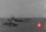 Image of casualties evacuated from landing craft Normandy France, 1944, second 36 stock footage video 65675080939