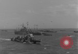 Image of casualties evacuated from landing craft Normandy France, 1944, second 40 stock footage video 65675080939