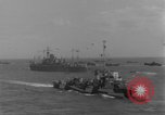 Image of casualties evacuated from landing craft Normandy France, 1944, second 49 stock footage video 65675080939