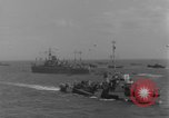 Image of casualties evacuated from landing craft Normandy France, 1944, second 50 stock footage video 65675080939