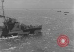 Image of casualties evacuated from landing craft Normandy France, 1944, second 52 stock footage video 65675080939