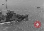 Image of casualties evacuated from landing craft Normandy France, 1944, second 53 stock footage video 65675080939