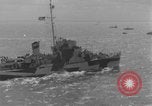 Image of casualties evacuated from landing craft Normandy France, 1944, second 55 stock footage video 65675080939