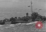 Image of casualties evacuated from landing craft Normandy France, 1944, second 58 stock footage video 65675080939