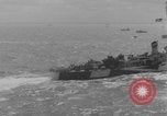 Image of casualties evacuated from landing craft Normandy France, 1944, second 62 stock footage video 65675080939