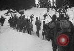 Image of US Army ski troops cross difficult terrain Washington State United States USA, 1941, second 16 stock footage video 65675080941