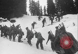 Image of US Army ski troops cross difficult terrain Washington State United States USA, 1941, second 19 stock footage video 65675080941