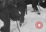 Image of US Army ski troops cross difficult terrain Washington State United States USA, 1941, second 33 stock footage video 65675080941