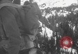 Image of US Army ski troops cross difficult terrain Washington State United States USA, 1941, second 36 stock footage video 65675080941