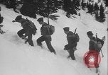 Image of US Army ski troops cross difficult terrain Washington State United States USA, 1941, second 50 stock footage video 65675080941