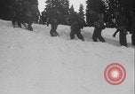 Image of US Army ski troops cross difficult terrain Washington State United States USA, 1941, second 57 stock footage video 65675080941