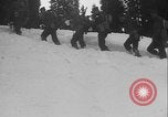 Image of US Army ski troops cross difficult terrain Washington State United States USA, 1941, second 58 stock footage video 65675080941