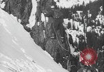 Image of US Army troops rock climbing Washington State United States USA, 1941, second 34 stock footage video 65675080942