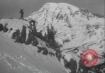 Image of US Army troops rock climbing Washington State United States USA, 1941, second 49 stock footage video 65675080942