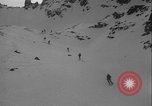 Image of Army ski troops descend mountain slopes Washington State United States USA, 1941, second 3 stock footage video 65675080943