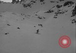Image of Army ski troops descend mountain slopes Washington State United States USA, 1941, second 6 stock footage video 65675080943