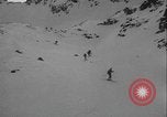 Image of Army ski troops descend mountain slopes Washington State United States USA, 1941, second 7 stock footage video 65675080943