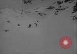 Image of Army ski troops descend mountain slopes Washington State United States USA, 1941, second 9 stock footage video 65675080943