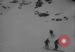 Image of Army ski troops descend mountain slopes Washington State United States USA, 1941, second 15 stock footage video 65675080943