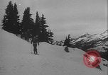 Image of Army ski troops descend mountain slopes Washington State United States USA, 1941, second 17 stock footage video 65675080943