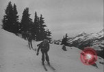 Image of Army ski troops descend mountain slopes Washington State United States USA, 1941, second 19 stock footage video 65675080943