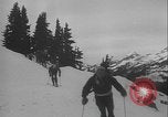 Image of Army ski troops descend mountain slopes Washington State United States USA, 1941, second 20 stock footage video 65675080943