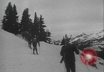 Image of Army ski troops descend mountain slopes Washington State United States USA, 1941, second 23 stock footage video 65675080943