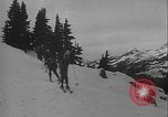 Image of Army ski troops descend mountain slopes Washington State United States USA, 1941, second 24 stock footage video 65675080943