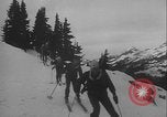 Image of Army ski troops descend mountain slopes Washington State United States USA, 1941, second 26 stock footage video 65675080943