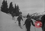 Image of Army ski troops descend mountain slopes Washington State United States USA, 1941, second 27 stock footage video 65675080943