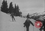 Image of Army ski troops descend mountain slopes Washington State United States USA, 1941, second 28 stock footage video 65675080943