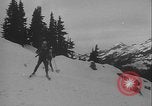 Image of Army ski troops descend mountain slopes Washington State United States USA, 1941, second 29 stock footage video 65675080943