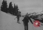 Image of Army ski troops descend mountain slopes Washington State United States USA, 1941, second 31 stock footage video 65675080943