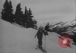 Image of Army ski troops descend mountain slopes Washington State United States USA, 1941, second 32 stock footage video 65675080943