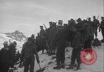 Image of Army ski troops descend mountain slopes Washington State United States USA, 1941, second 35 stock footage video 65675080943