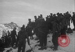 Image of Army ski troops descend mountain slopes Washington State United States USA, 1941, second 37 stock footage video 65675080943