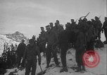 Image of Army ski troops descend mountain slopes Washington State United States USA, 1941, second 38 stock footage video 65675080943