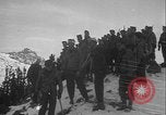 Image of Army ski troops descend mountain slopes Washington State United States USA, 1941, second 39 stock footage video 65675080943