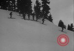 Image of Army ski troops descend mountain slopes Washington State United States USA, 1941, second 42 stock footage video 65675080943