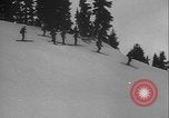 Image of Army ski troops descend mountain slopes Washington State United States USA, 1941, second 43 stock footage video 65675080943