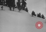 Image of Army ski troops descend mountain slopes Washington State United States USA, 1941, second 44 stock footage video 65675080943