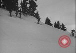 Image of Army ski troops descend mountain slopes Washington State United States USA, 1941, second 45 stock footage video 65675080943