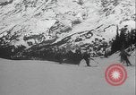 Image of Army ski troops descend mountain slopes Washington State United States USA, 1941, second 51 stock footage video 65675080943