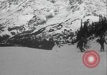 Image of Army ski troops descend mountain slopes Washington State United States USA, 1941, second 52 stock footage video 65675080943