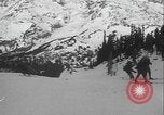 Image of Army ski troops descend mountain slopes Washington State United States USA, 1941, second 53 stock footage video 65675080943